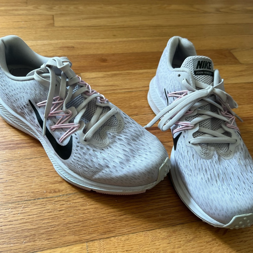 White Nike running shoe